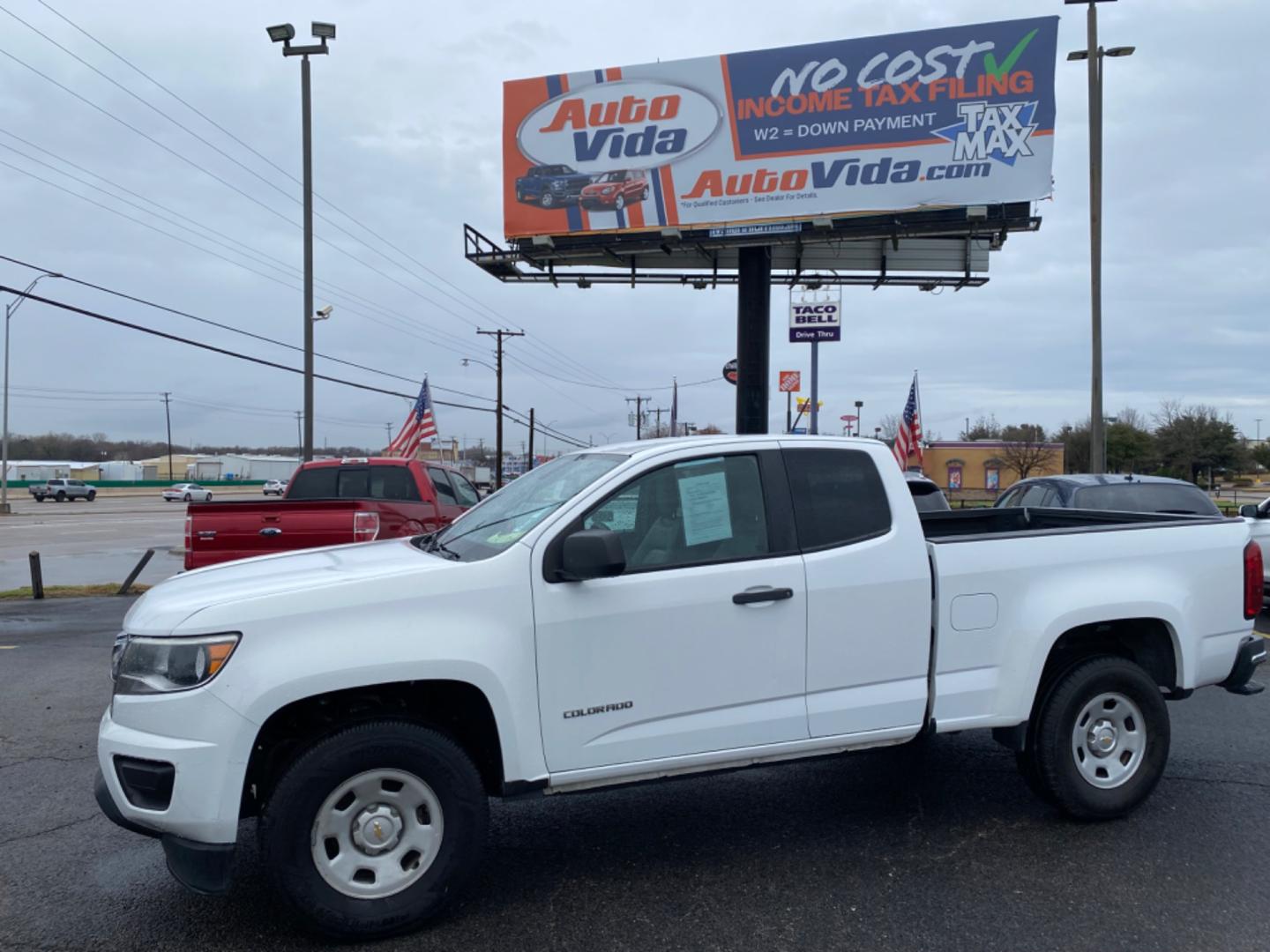 2015 WHITE Chevrolet Colorado WT Ext. Cab 2WD (1GCHSAEA6F1) with an 2.5L L4 DOHC 16V GAS engine, 6-Speed Automatic transmission, located at 420 I-35E, Lancaster, TX, 75146, (469) 297-4144, 32.593929, -96.823685 - Photo#0